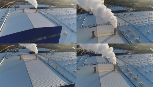 烟从工厂或工厂的屋顶上的管道排出，生产车间的屋顶上有一根管道，白色的浓烟从管道排出高清在线视频素材下载