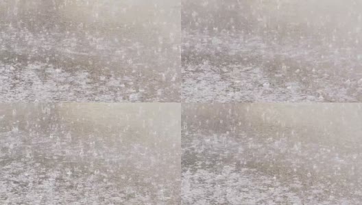 雨落在柏油路上，慢镜头180帧/秒高清在线视频素材下载