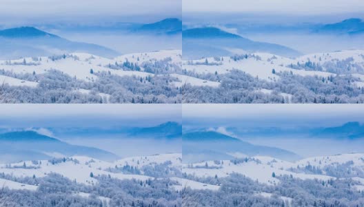 山峰上的雪被风吹走了。冬天的风景。天很冷，下着雪。高清在线视频素材下载