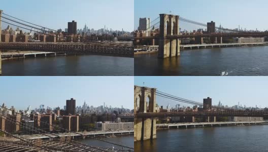 纽约曼哈顿东河上的布鲁克林大桥鸟瞰图。无人机飞过交通道路高清在线视频素材下载