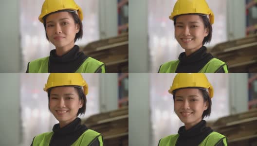 一个微笑的年轻女仓库工人的肖像高清在线视频素材下载