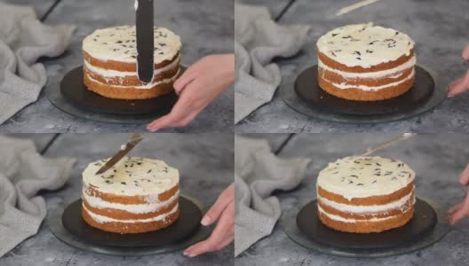 糕点师，用西梅和鲜奶油制作分层蛋糕高清在线视频素材下载
