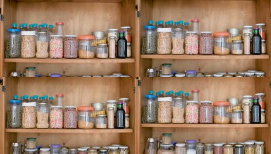 木制的食品储藏室堆满了散装产品的玻璃罐。高清在线视频素材下载