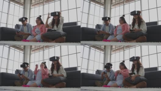 自闭症亚洲家庭的孩子戴着VR眼镜在客厅玩电子游戏。高清在线视频素材下载