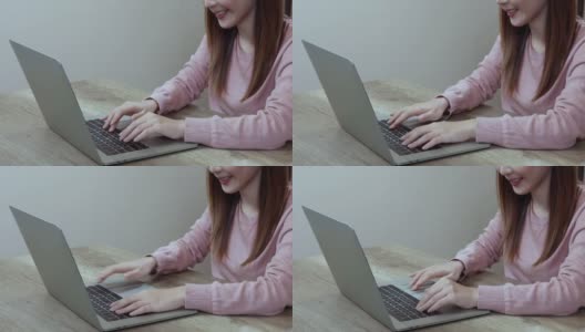 漂亮的女人在家里用笔记本电脑工作，亚洲女商人在家里通过视频在线会议。高清在线视频素材下载