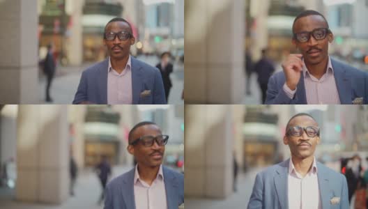 黑人商人戴着智能眼镜和通勤。黑人商人戴着智能眼镜，在增强现实元空间工作，参加商务会议，通勤于市中心的金融商务区。高清在线视频素材下载