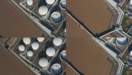 一艘停泊在码头上的液化天然气(LNG)油轮的实时/鸟瞰图高清在线视频素材下载