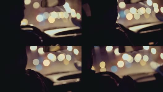 一个晚上在车里亲吻女友的手的家伙高清在线视频素材下载