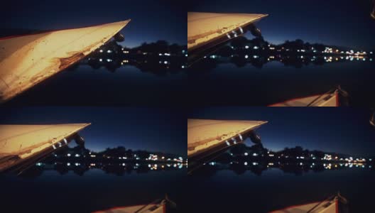 城市夜晚的散焦影像，水的倒影高清在线视频素材下载