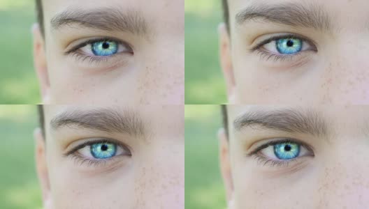 蓝色眼睛的男孩特写高清在线视频素材下载