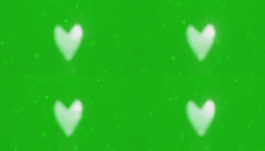 心脏与粒子模糊在孤立的绿色高清在线视频素材下载