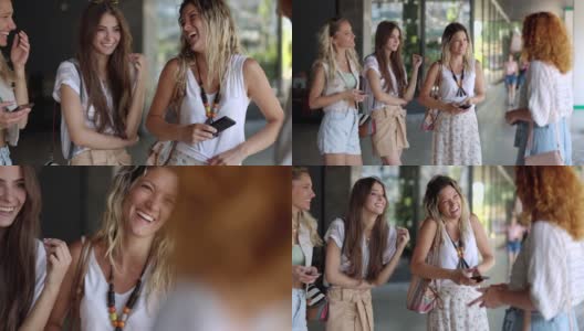 一群快乐的女性朋友和她们在城市街道上遇到的朋友聊天。高清在线视频素材下载