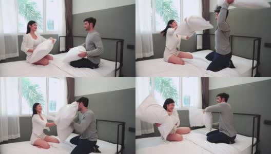 夫妻在床上抱着枕头吵架高清在线视频素材下载