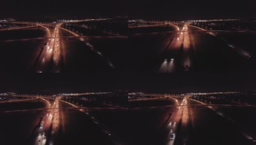 鸟瞰图的立交桥和十字路口的道路，桥梁，高架桥在夜晚的波兰城外，高清在线视频素材下载