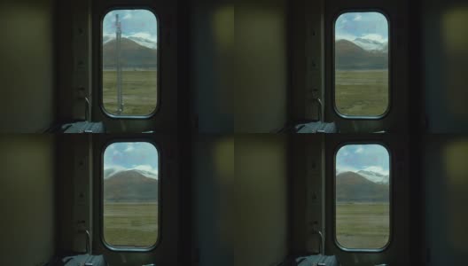 近距离观察:通过一个小窗口可以看到令人叹为观止的西藏风景。高清在线视频素材下载