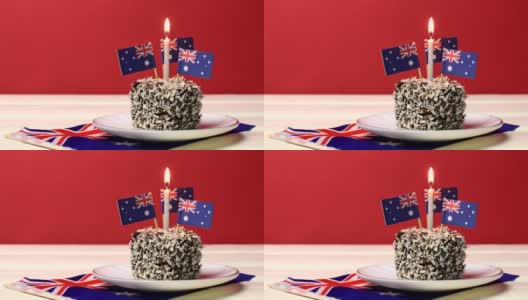 蜡烛拉明顿蛋糕。澳洲国庆日快乐。高清在线视频素材下载