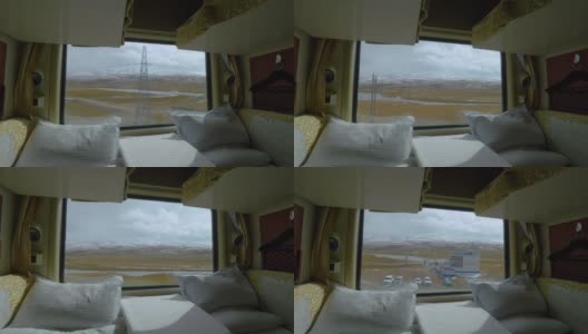 近距离观察:卧铺列车的窗口提供了令人惊叹的喜马拉雅自然景观高清在线视频素材下载