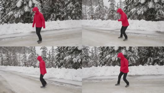 亚洲女人在结冰的路上滑倒高清在线视频素材下载