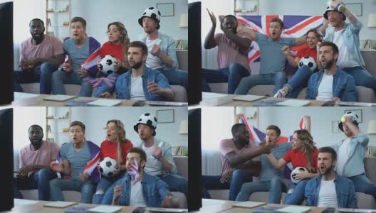 英国朋友在电视上看足球比赛，庆祝国家队进球高清在线视频素材下载