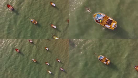 鸟瞰图的传统渔船停泊在碧绿的海洋里约热内卢do Fogo，巴西。高清在线视频素材下载