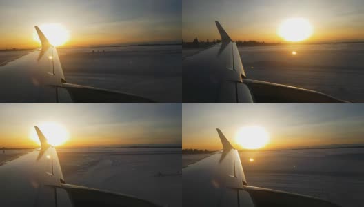 近距离观察:日出时分，飞机在芬兰的雪地上降落时的机翼高清在线视频素材下载