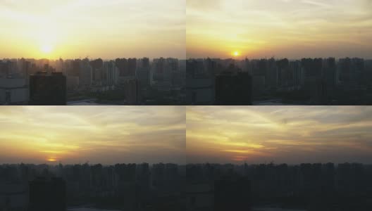 上海朦胧的夕阳时光流逝在住宅区的公寓楼里。高清在线视频素材下载