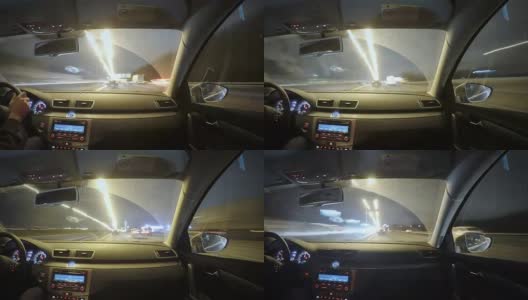 在夜晚的城市交通中驾驶高清在线视频素材下载