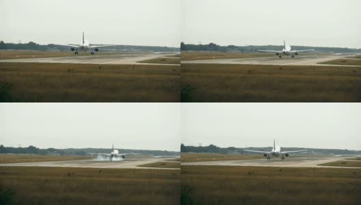 双引擎飞机在清晨接近机场高清在线视频素材下载