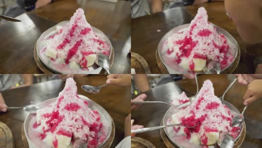 吃着红刨冰，泰国街头小吃。高清在线视频素材下载
