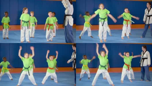 跆拳道课上做跳跃运动高清在线视频素材下载