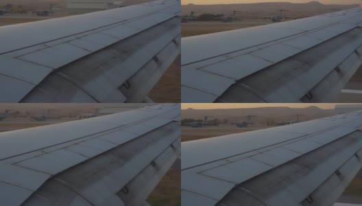 在机场跑道上着陆的客机机翼高清在线视频素材下载