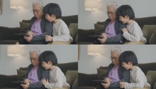 奶奶教孙子做作业。高清在线视频素材下载