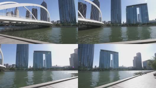 现代城市中城的钢桥和现代建筑高清在线视频素材下载