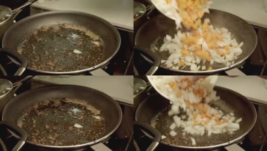 胡萝卜，洋葱和芹菜在煎锅里高清在线视频素材下载