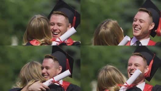 大学同学们在毕业典礼后以好心情欢笑拥抱高清在线视频素材下载
