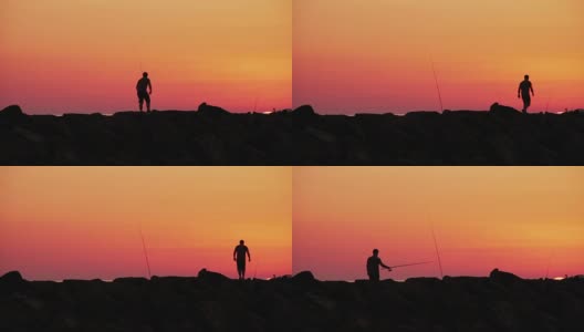 渔民在日落时的岩石上捕鱼-渔人海高清在线视频素材下载