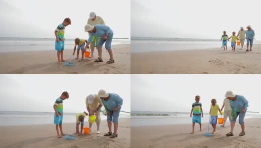 在海滩上寻找贝壳高清在线视频素材下载