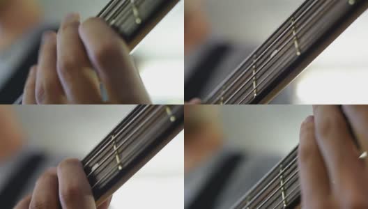 吉他手弹奏电子贝斯吉他高清在线视频素材下载