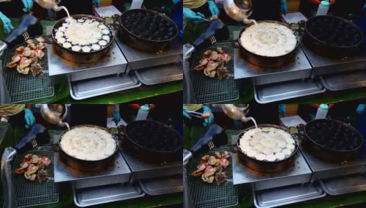 一种泰国甜食海鲜(Kanom Krok)泰国传统甜食，椰奶和面粉高清在线视频素材下载