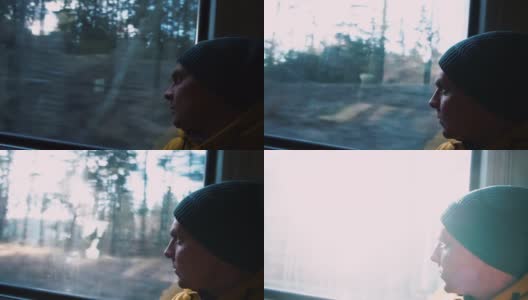 人看着窗外的火车移动的城市。阳光穿过移动的树高清在线视频素材下载