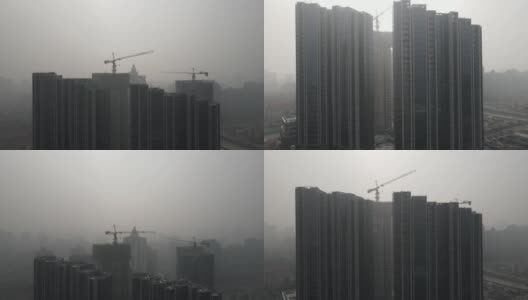 建筑工地出现重度雾霾空气污染，市区建筑出现雾霾高清在线视频素材下载