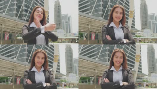 亚洲年轻聪明的女商人在城市的公司办公室工作。快乐自信的女孩微笑着站在户外。业务概念的职位申请和招聘。高清在线视频素材下载