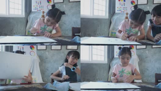 亚洲女孩在家里或小学用纸上用铅笔画画高清在线视频素材下载