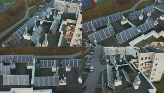 飞过安装在公寓楼屋顶上的太阳能电池板。高清在线视频素材下载