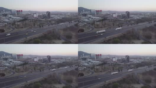 日落时对克雷塔罗市的空中拍摄高清在线视频素材下载