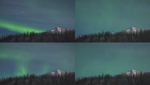 绿色北极光的时间流逝。雪山树冬夜。高清在线视频素材下载