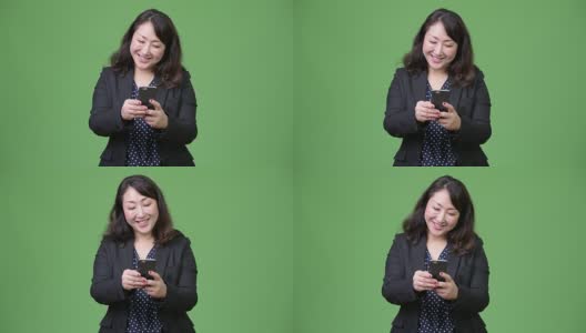 成熟美丽的亚洲女商人使用电话高清在线视频素材下载