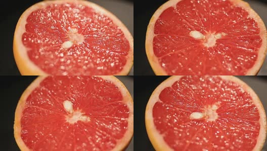 美味的柚子切成鲜榨汁，柑橘类水果的健康菜单高清在线视频素材下载