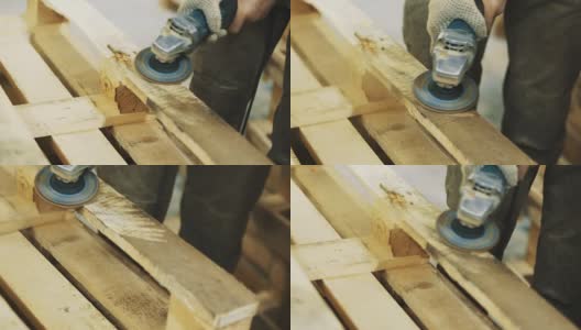 木工人用角磨机打磨木条结构高清在线视频素材下载