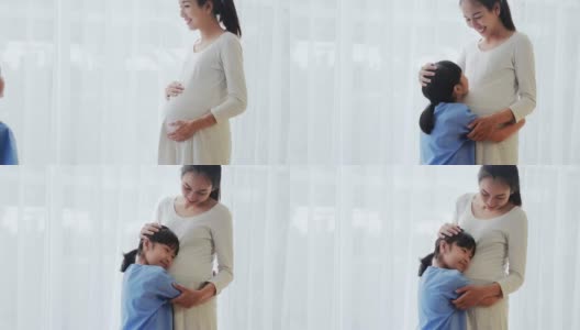 孕妇和儿童拥抱，中国和香港的医疗系统。怀孕和生育高清在线视频素材下载
